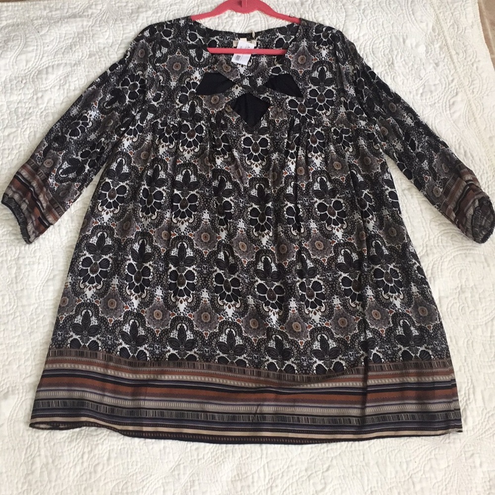 NWT dress with cutouts